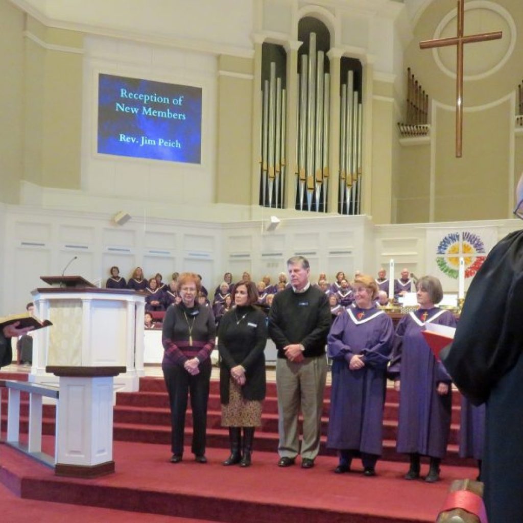 Photo of new members taking vows