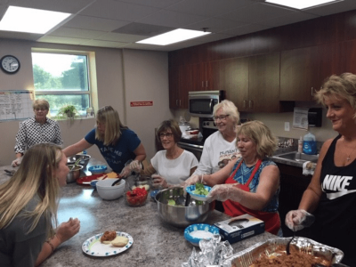 Volunteers making lunch at Epworth